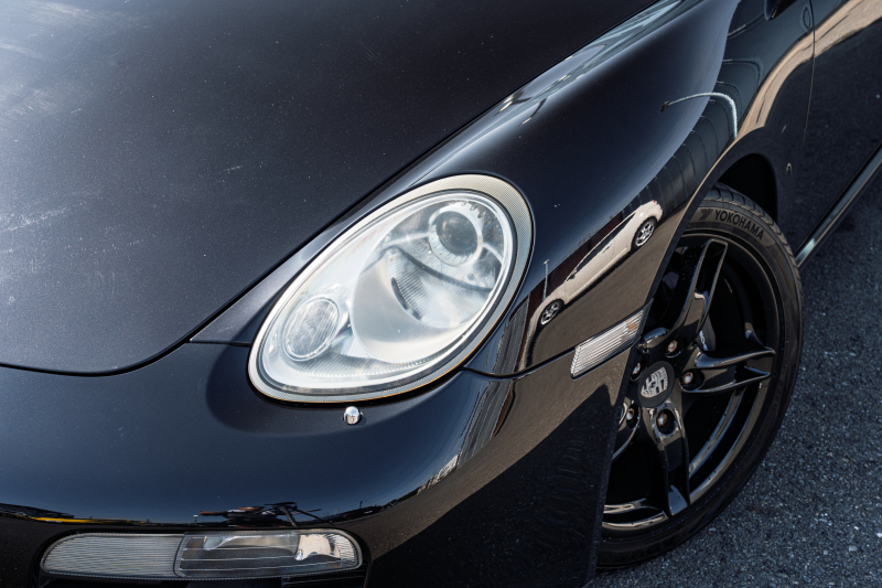 ポルシェ ボクスター(Type987) ﾍﾞｰｽｸﾞﾚｰﾄﾞ　5速ﾏﾆｭｱﾙ 左ﾊﾝﾄﾞﾙ ﾌﾞﾗｯｸﾊｰﾌﾚｻﾞｰｼｰﾄ ｼｰﾄﾋｰﾀｰ ﾌﾞﾗｯｸｿﾌﾄﾄｯﾌﾟ ｶﾛｯﾂｪﾘｱﾅﾋﾞ ﾌﾙｾｸﾞTV ｷｾﾉﾝ ﾎﾞｸｽﾀｰS18ｲﾝﾁAW　2年保証