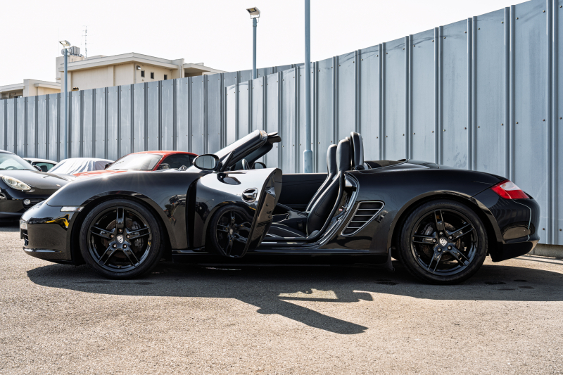 ポルシェ ボクスター(Type987) ﾍﾞｰｽｸﾞﾚｰﾄﾞ　5速ﾏﾆｭｱﾙ 左ﾊﾝﾄﾞﾙ ﾌﾞﾗｯｸﾊｰﾌﾚｻﾞｰｼｰﾄ ｼｰﾄﾋｰﾀｰ ﾌﾞﾗｯｸｿﾌﾄﾄｯﾌﾟ ｶﾛｯﾂｪﾘｱﾅﾋﾞ ﾌﾙｾｸﾞTV ｷｾﾉﾝ ﾎﾞｸｽﾀｰS18ｲﾝﾁAW　2年保証