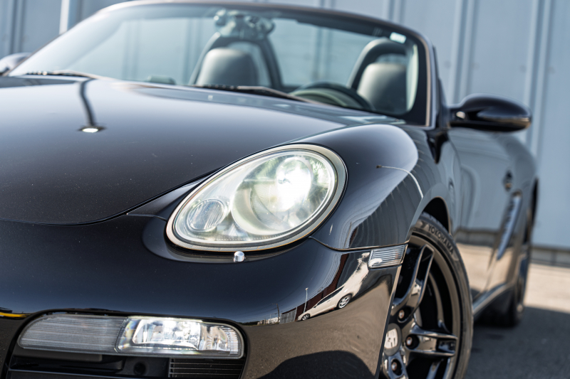 ポルシェ ボクスター(Type987) ﾍﾞｰｽｸﾞﾚｰﾄﾞ　5速ﾏﾆｭｱﾙ 左ﾊﾝﾄﾞﾙ ﾌﾞﾗｯｸﾊｰﾌﾚｻﾞｰｼｰﾄ ｼｰﾄﾋｰﾀｰ ﾌﾞﾗｯｸｿﾌﾄﾄｯﾌﾟ ｶﾛｯﾂｪﾘｱﾅﾋﾞ ﾌﾙｾｸﾞTV ｷｾﾉﾝ ﾎﾞｸｽﾀｰS18ｲﾝﾁAW　2年保証