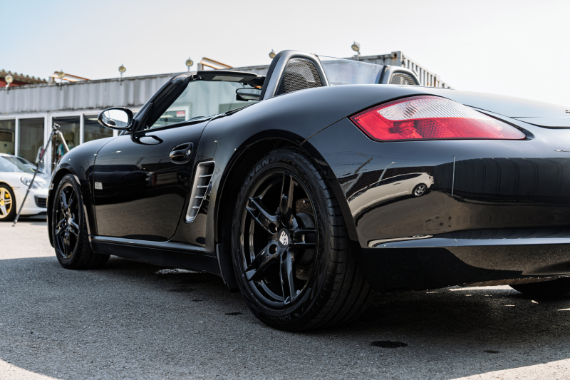 ポルシェ ボクスター(Type987) ﾍﾞｰｽｸﾞﾚｰﾄﾞ　5速ﾏﾆｭｱﾙ 左ﾊﾝﾄﾞﾙ ﾌﾞﾗｯｸﾊｰﾌﾚｻﾞｰｼｰﾄ ｼｰﾄﾋｰﾀｰ ﾌﾞﾗｯｸｿﾌﾄﾄｯﾌﾟ ｶﾛｯﾂｪﾘｱﾅﾋﾞ ﾌﾙｾｸﾞTV ｷｾﾉﾝ ﾎﾞｸｽﾀｰS18ｲﾝﾁAW　2年保証