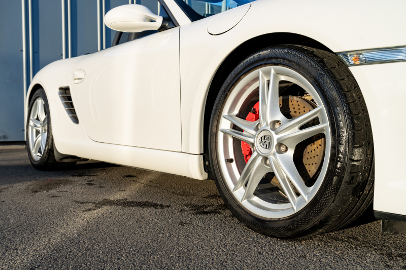 ポルシェ ボクスター(Type987) S ｽﾎﾟｰﾂｸﾛﾉPKG　後期ﾓﾃﾞﾙ ﾌﾞﾗｯｸﾊｰﾌﾚｻﾞｰｼｰﾄ ｼｰﾄﾋｰﾀｰ ﾌﾞﾗｯｸｿﾌﾄﾄｯﾌﾟ ｽﾎﾟｰﾂﾃﾞｻﾞｲﾝｽﾃｱ ﾀﾞｲﾅﾐｯｸｺｰﾅﾘﾝｸﾞﾗｲﾄ ｸﾙｺﾝ ｵｰﾄｴｱｺﾝ 19ｲﾝﾁAW ﾀﾞｳﾝｻｽ　2年保証