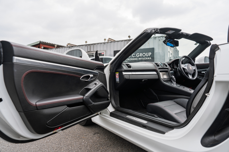 ポルシェ ボクスター(Type981) ﾍﾞｰｽｸﾞﾚｰﾄﾞ ｽﾎﾟｰﾂｸﾛﾉPKG　ﾌﾞﾗｯｸﾚｻﾞｰｲﾝﾃﾘｱ ｼｰﾄﾋｰﾀｰ&ﾍﾞﾝﾁﾚｰﾀｰ ﾚｯﾄﾞｿﾌﾄﾄｯﾌﾟ ﾅﾋﾞTV ｽﾎﾟｰﾂﾃﾞｻﾞｲﾝｽﾃｱﾘﾝｸﾞ PDLS ﾎﾞｸｽﾀｰ18ｲﾝﾁAW　2年保証