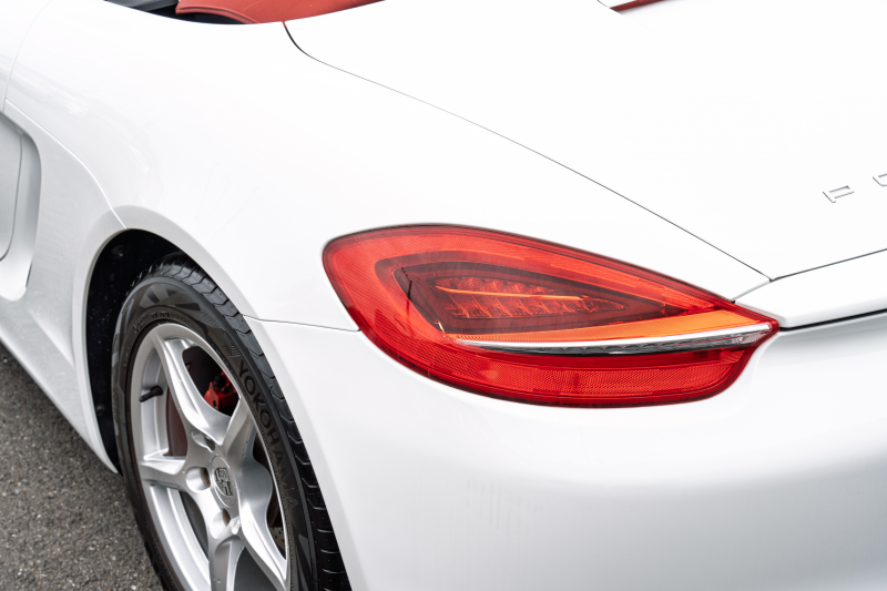 ポルシェ ボクスター(Type981) ﾍﾞｰｽｸﾞﾚｰﾄﾞ ｽﾎﾟｰﾂｸﾛﾉPKG　ﾌﾞﾗｯｸﾚｻﾞｰｲﾝﾃﾘｱ ｼｰﾄﾋｰﾀｰ&ﾍﾞﾝﾁﾚｰﾀｰ ﾚｯﾄﾞｿﾌﾄﾄｯﾌﾟ ﾅﾋﾞTV ｽﾎﾟｰﾂﾃﾞｻﾞｲﾝｽﾃｱﾘﾝｸﾞ PDLS ﾎﾞｸｽﾀｰ18ｲﾝﾁAW　2年保証