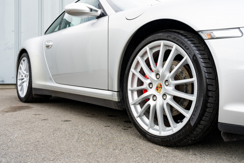 ポルシェ 911(Type997) ｶﾚﾗ4 ｽﾎﾟｰﾂｸﾛﾉPKG　ﾌﾞﾗｯｸﾚｻﾞｰｼｰﾄ ｼｰﾄﾋｰﾀｰ ﾅﾋﾞTV ｽﾎﾟｴｸﾞ PASM ｽﾎﾟｰﾂﾃﾞｻﾞｲﾝ19ｲﾝﾁAW ｷｾﾉﾝﾍｯﾄﾞﾗｲﾄ ｵｰﾄｴｱｺﾝ PSM F/Rﾌｫｸﾞ　2年保証