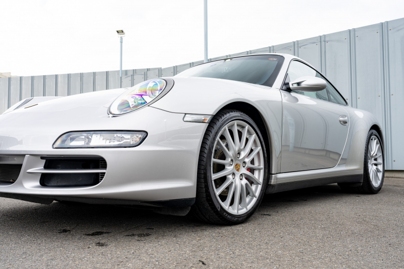 ポルシェ 911(Type997) ｶﾚﾗ4 ｽﾎﾟｰﾂｸﾛﾉPKG　ﾌﾞﾗｯｸﾚｻﾞｰｼｰﾄ ｼｰﾄﾋｰﾀｰ ﾅﾋﾞTV ｽﾎﾟｴｸﾞ PASM ｽﾎﾟｰﾂﾃﾞｻﾞｲﾝ19ｲﾝﾁAW ｷｾﾉﾝﾍｯﾄﾞﾗｲﾄ ｵｰﾄｴｱｺﾝ PSM F/Rﾌｫｸﾞ　2年保証