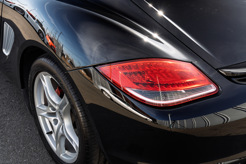 ポルシェ ケイマン(Type987) S　後期ﾓﾃﾞﾙ ｵｰｼｬﾝﾌﾞﾙｰﾊｰﾌﾚｻﾞｰｼｰﾄ ｶﾛｯﾂｪﾘｱﾅﾋﾞTV ｷｾﾉﾝ&ﾀﾞｲﾅﾐｯｸｺｰﾅﾘﾝｸﾞﾗｲﾄ ｵｰﾄｴｱｺﾝ ｹｲﾏﾝS18ｲﾝﾁAW　2年保証