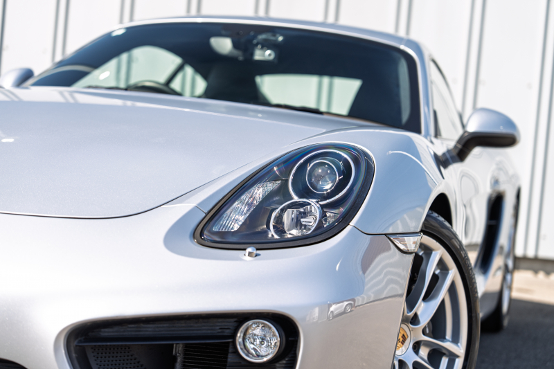 ポルシェ ケイマン(Type981) ﾍﾞｰｽｸﾞﾚｰﾄﾞ ｽﾎﾟｰﾂｸﾛﾉPKG　ﾌﾞﾗｯｸﾚｻﾞｰｼｰﾄ ｼｰﾄﾋｰﾀｰ ﾅﾋﾞTV ｽﾎﾟｰﾂﾃﾞｻﾞｲﾝｽﾃｱﾘﾝｸﾞ PDLS BOSE ｽﾎﾟｰﾂｼｬｰｼ ﾎﾞｸｽﾀｰS19ｲﾝﾁAW　2年保証