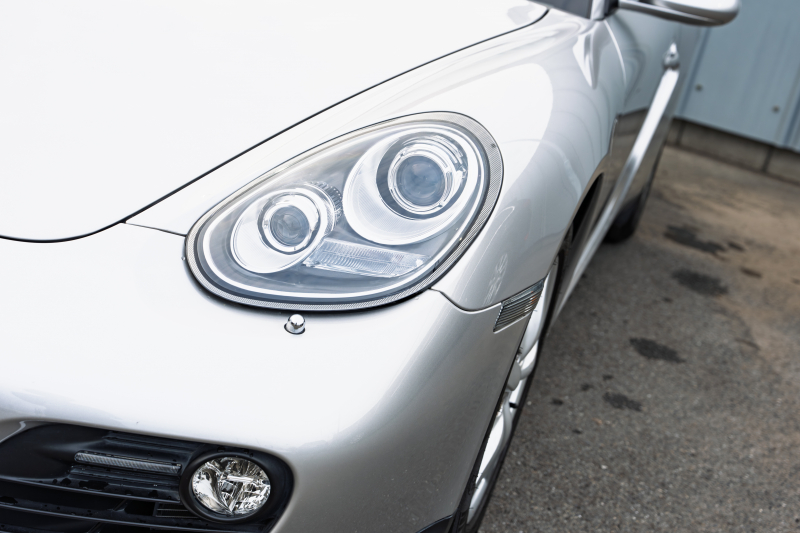 ポルシェ ケイマン(Type987) ﾍﾞｰｽｸﾞﾚｰﾄﾞ　後期ﾓﾃﾞﾙ ﾌﾞﾗｯｸﾊｰﾌﾚｻﾞｰｼｰﾄ ｼｰﾄﾋｰﾀｰ ｸﾗﾘｵﾝﾅﾋﾞ ﾌﾙｾｸﾞTV ﾊﾞｯｸｶﾒﾗ ﾀﾞｲﾅﾐｯｸｺｰﾅﾘﾝｸﾞﾗｲﾄ ｵｰﾄｴｱｺﾝ ｹｲﾏﾝ17ｲﾝﾁAW　2年保証