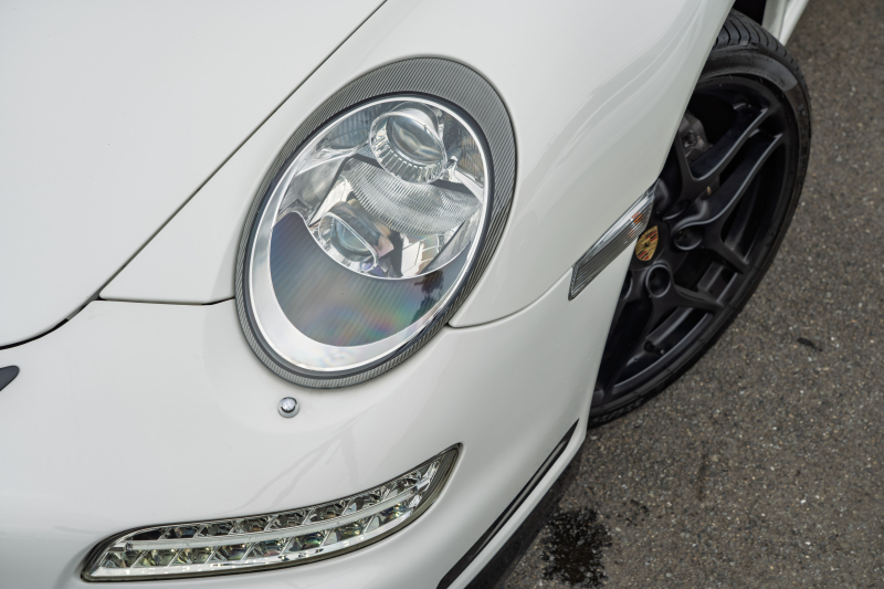 ポルシェ 911(Type997) ｶﾚﾗ　GT3ﾙｯｸｴｱﾛ ﾌﾞﾗｯｸﾚｻﾞｰｼｰﾄ ｼｰﾄﾋｰﾀｰ ｱﾙｶﾝﾀｰﾗﾙｰﾌﾗｲﾅｰ ﾊﾟｲｵﾆｱﾅﾋﾞ ｵｰﾄｴｱｺﾝ PSM ｷｾﾉﾝﾗｲﾄ F/Rﾌｫｸﾞ 後期ｶﾚﾗS19ｲﾝﾁAW　2年保証