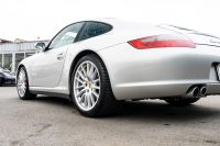 ポルシェ 911(Type997) ｶﾚﾗ4 ｽﾎﾟｰﾂｸﾛﾉPKG　ﾌﾞﾗｯｸﾚｻﾞｰｼｰﾄ ｼｰﾄﾋｰﾀｰ ﾅﾋﾞTV ｽﾎﾟｴｸﾞ PASM ｽﾎﾟｰﾂﾃﾞｻﾞｲﾝ19ｲﾝﾁAW ｷｾﾉﾝﾍｯﾄﾞﾗｲﾄ ｵｰﾄｴｱｺﾝ PSM F/Rﾌｫｸﾞ　2年保証