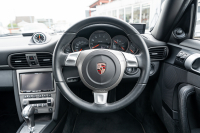 ポルシェ 911(Type997) ｶﾚﾗ4 ｽﾎﾟｰﾂｸﾛﾉPKG　ﾌﾞﾗｯｸﾚｻﾞｰｼｰﾄ ｼｰﾄﾋｰﾀｰ ﾅﾋﾞTV ｽﾎﾟｴｸﾞ PASM ｽﾎﾟｰﾂﾃﾞｻﾞｲﾝ19ｲﾝﾁAW ｷｾﾉﾝﾍｯﾄﾞﾗｲﾄ ｵｰﾄｴｱｺﾝ PSM F/Rﾌｫｸﾞ　2年保証