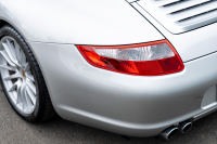 ポルシェ 911(Type997) ｶﾚﾗ4 ｽﾎﾟｰﾂｸﾛﾉPKG　ﾌﾞﾗｯｸﾚｻﾞｰｼｰﾄ ｼｰﾄﾋｰﾀｰ ﾅﾋﾞTV ｽﾎﾟｴｸﾞ PASM ｽﾎﾟｰﾂﾃﾞｻﾞｲﾝ19ｲﾝﾁAW ｷｾﾉﾝﾍｯﾄﾞﾗｲﾄ ｵｰﾄｴｱｺﾝ PSM F/Rﾌｫｸﾞ　2年保証