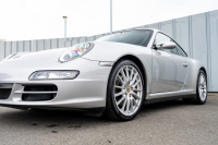 ポルシェ 911(Type997) ｶﾚﾗ4 ｽﾎﾟｰﾂｸﾛﾉPKG　ﾌﾞﾗｯｸﾚｻﾞｰｼｰﾄ ｼｰﾄﾋｰﾀｰ ﾅﾋﾞTV ｽﾎﾟｴｸﾞ PASM ｽﾎﾟｰﾂﾃﾞｻﾞｲﾝ19ｲﾝﾁAW ｷｾﾉﾝﾍｯﾄﾞﾗｲﾄ ｵｰﾄｴｱｺﾝ PSM F/Rﾌｫｸﾞ　2年保証