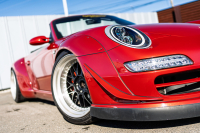 ポルシェ 911(Type997) ｶﾚﾗ4 ｶﾌﾞﾘｵﾚ　RWB997 ﾚｷﾞｭﾗｰﾜｲﾄﾞﾎﾞﾃﾞｨ RWBｺﾗﾎﾞﾚｰｼｮﾝWORK Meister19AW Fﾀﾞｳﾝｻｽ ﾘｱ車高調 黒革 ﾅﾋﾞTV ETC FCLﾘﾝｸﾞｷｾﾉﾝ LEDﾄﾞﾗｲﾋﾞﾝｸﾞﾗｲﾄ&ﾃｰﾙ ﾊﾟﾄﾞﾙｼﾌﾄ