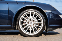 ポルシェ 911(Type997) ｶﾚﾗ　ﾃﾗｺｯﾀﾚｻﾞｰｼｰﾄ ｱﾙｶﾝﾀｰﾗﾙｰﾌﾗｲﾅｰ ｲｸﾘﾌﾟｽﾅﾋﾞTV ｵｰﾄｴｱｺﾝ PSM ｷｾﾉﾝﾗｲﾄ F/Rﾌｫｸﾞ ｽﾎﾟｰﾂﾃﾞｻﾞｲﾝ19ｲﾝﾁAW　2年保証