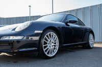 ポルシェ 911(Type997) ｶﾚﾗ　ﾃﾗｺｯﾀﾚｻﾞｰｼｰﾄ ｱﾙｶﾝﾀｰﾗﾙｰﾌﾗｲﾅｰ ｲｸﾘﾌﾟｽﾅﾋﾞTV ｵｰﾄｴｱｺﾝ PSM ｷｾﾉﾝﾗｲﾄ F/Rﾌｫｸﾞ ｽﾎﾟｰﾂﾃﾞｻﾞｲﾝ19ｲﾝﾁAW　2年保証